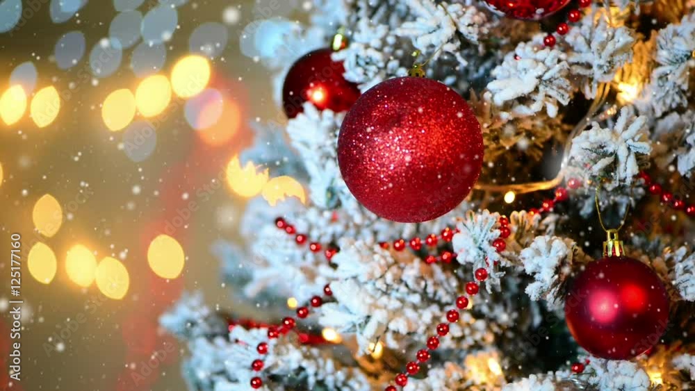 Christmas and New Year's indoors decoration on the Christmas tree. Bokeh light , copy space Christmas and New Year's indoors decoration on the Christmas tree. Bokeh light , copy space