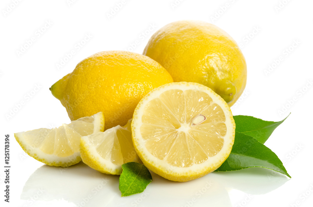 Two lemons and half with leaves isolated on white background Two lemons and half with leaves isolated on white background