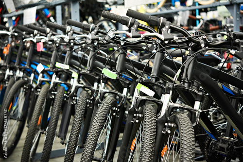 Modern mountain bikes in shop