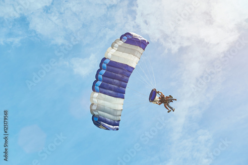 man on paraglider