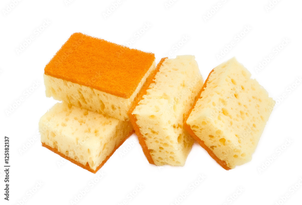 Several cleaning sponges on a light background