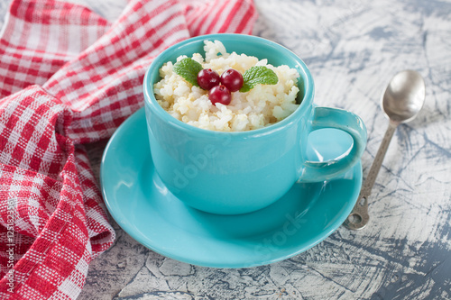 millet rice porridge in a bowl on a table, selective focus