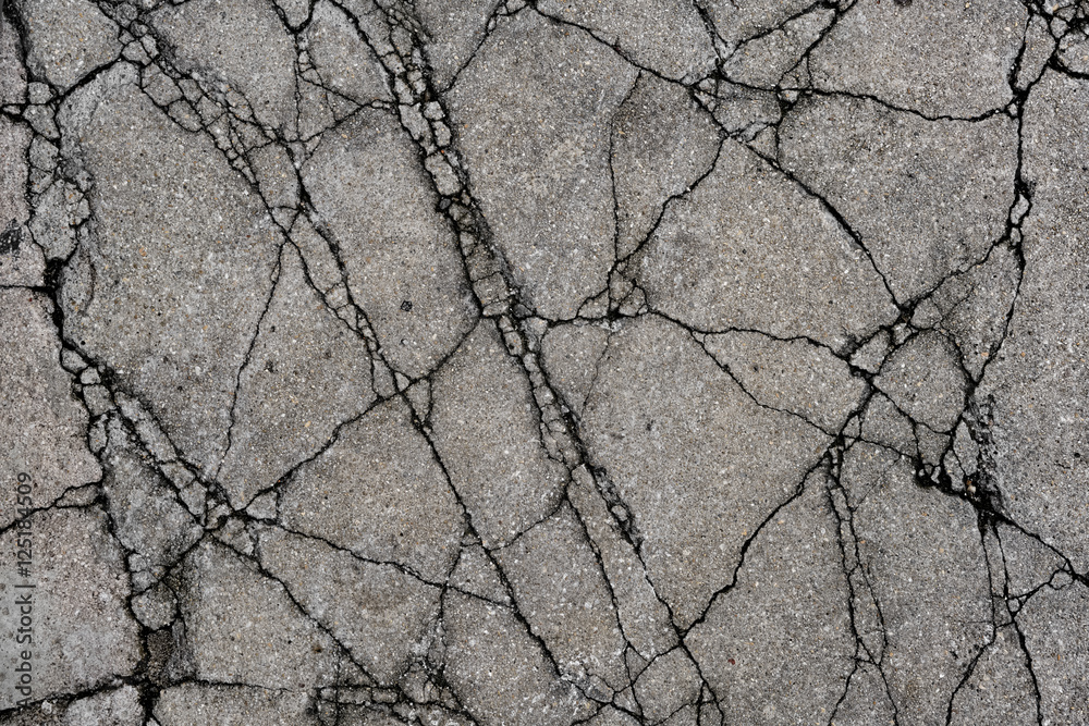 Naklejka premium Cracked concrete street pavement, Penang, Malaysia