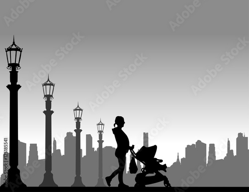 Pregnant woman walking with baby in stroller on the street, one in the series of similar images silhouette