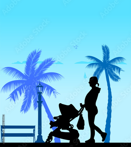 Pregnant woman walking with baby in stroller on the beach, one in the series of similar images silhouette