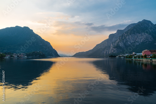 Lake Como at sunset, on the right the country of Lecco, to the left the lakeside of Malgrate, Italy  © AleMasche72
