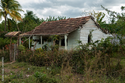 Ruined old house by road in Trinidad, Cuba © CAESARstock