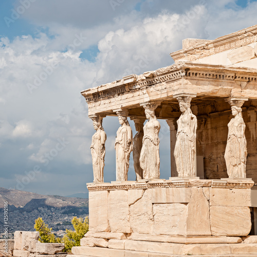 Acropolis, Erectheion, caryatids with panoramic view of the Athens, Greece