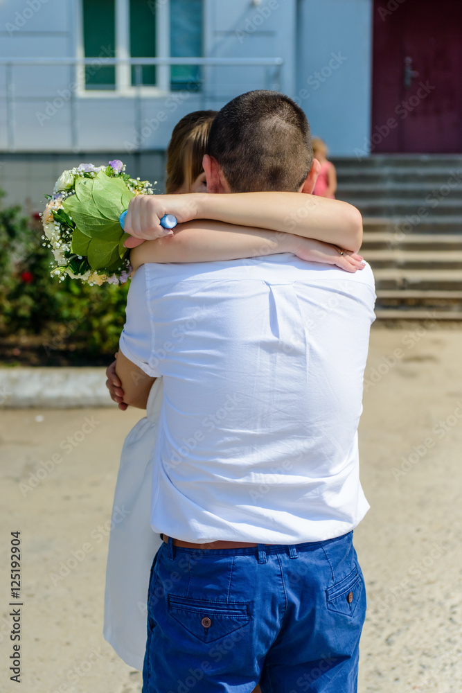 Loving newlyweds enjoy a romantic kiss Loving newlyweds enjoy a romantic kiss