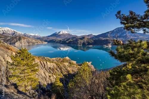 Serre Poncon Lake from Le Rousset with Winter view on Saint Vincent Les Fort and Le Sauze du Lac. A peaceful area in Hautes Alpes, the Southern French Alps. France © Francois Roux