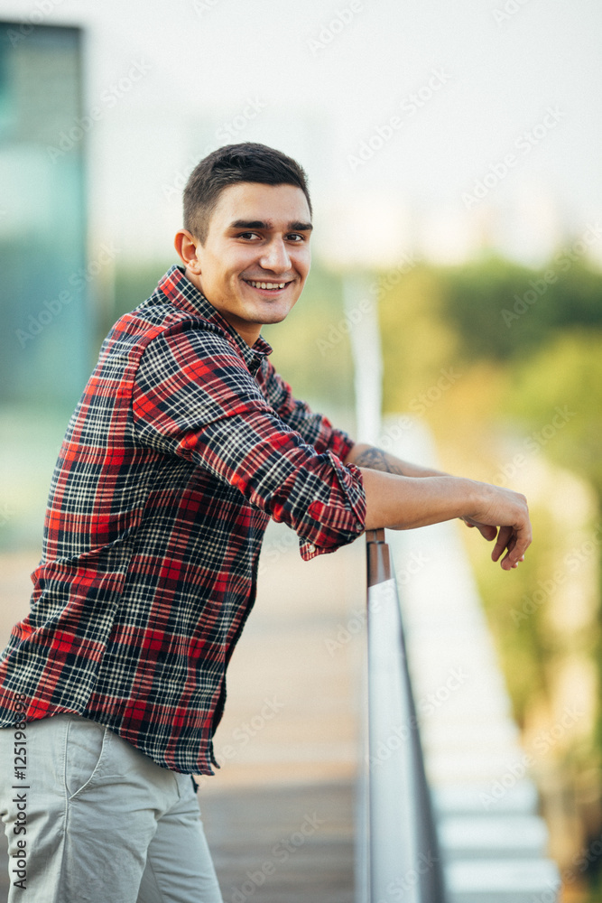 Fashionable man posing in front of camera Fashionable man posing in front of camera
