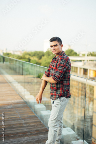 Fototapeta Naklejka Na Ścianę i Meble -  Fashionable man posing in front of camera