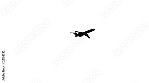 Silhouette of airplane flying isolated over a white background