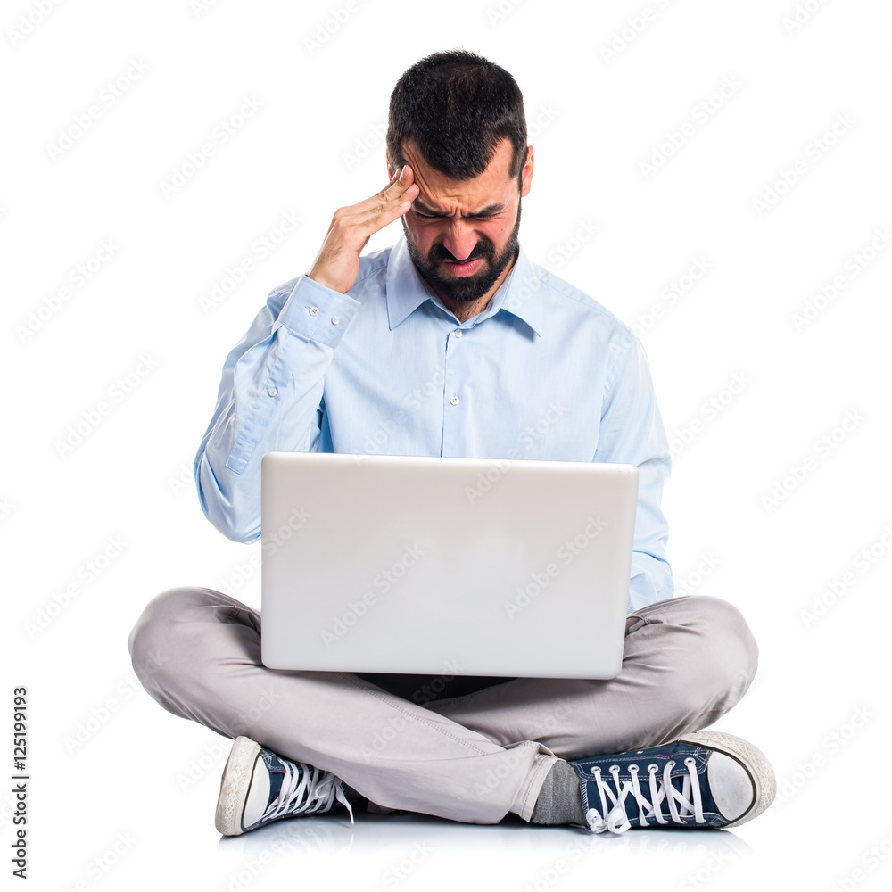 Frustrated man with laptop Frustrated man with laptop