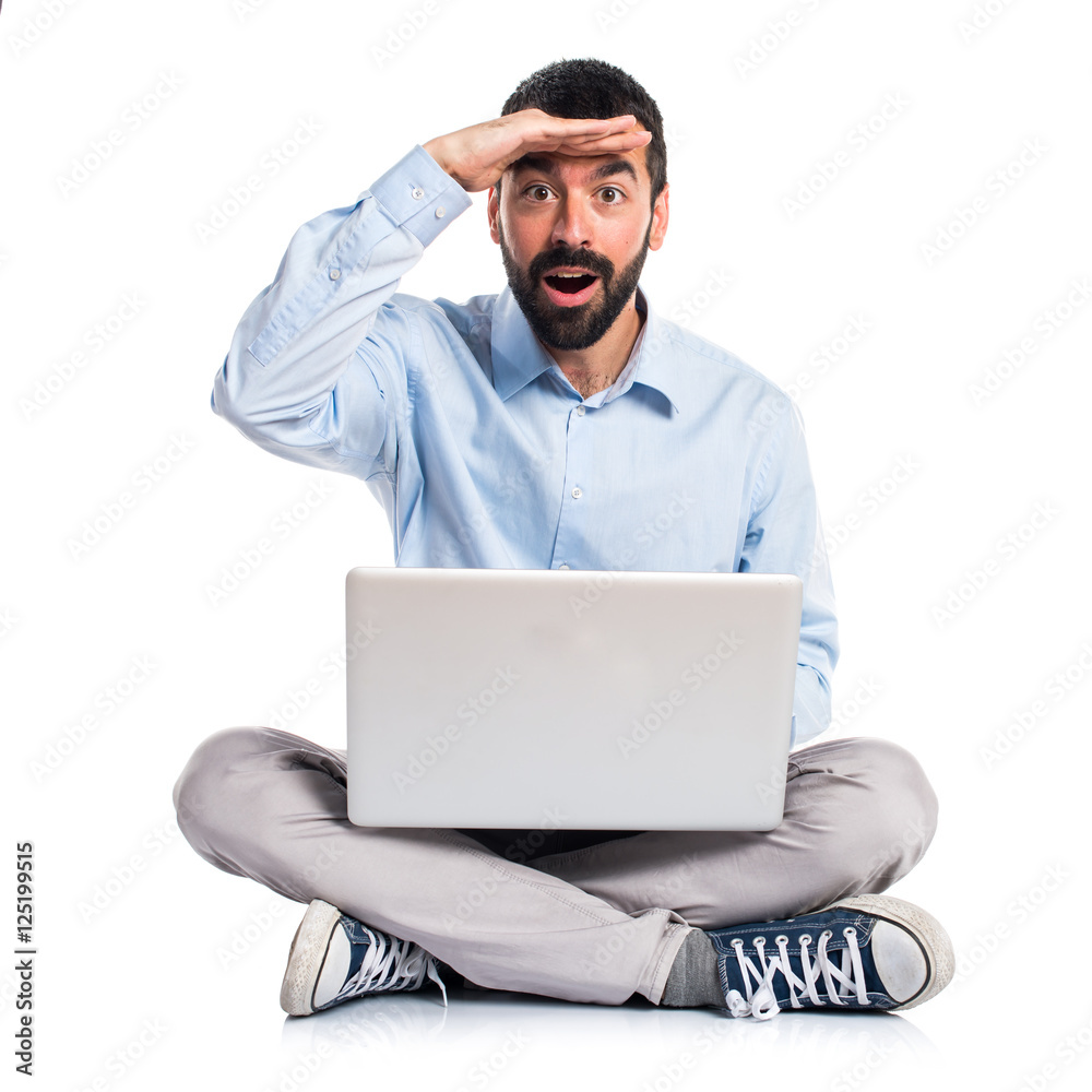 Man with laptop showing something Man with laptop showing something