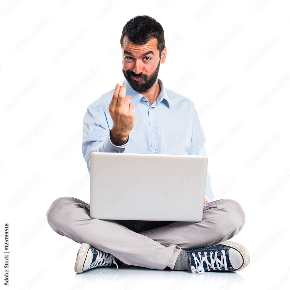 Man with laptop coming gesture Man with laptop coming gesture