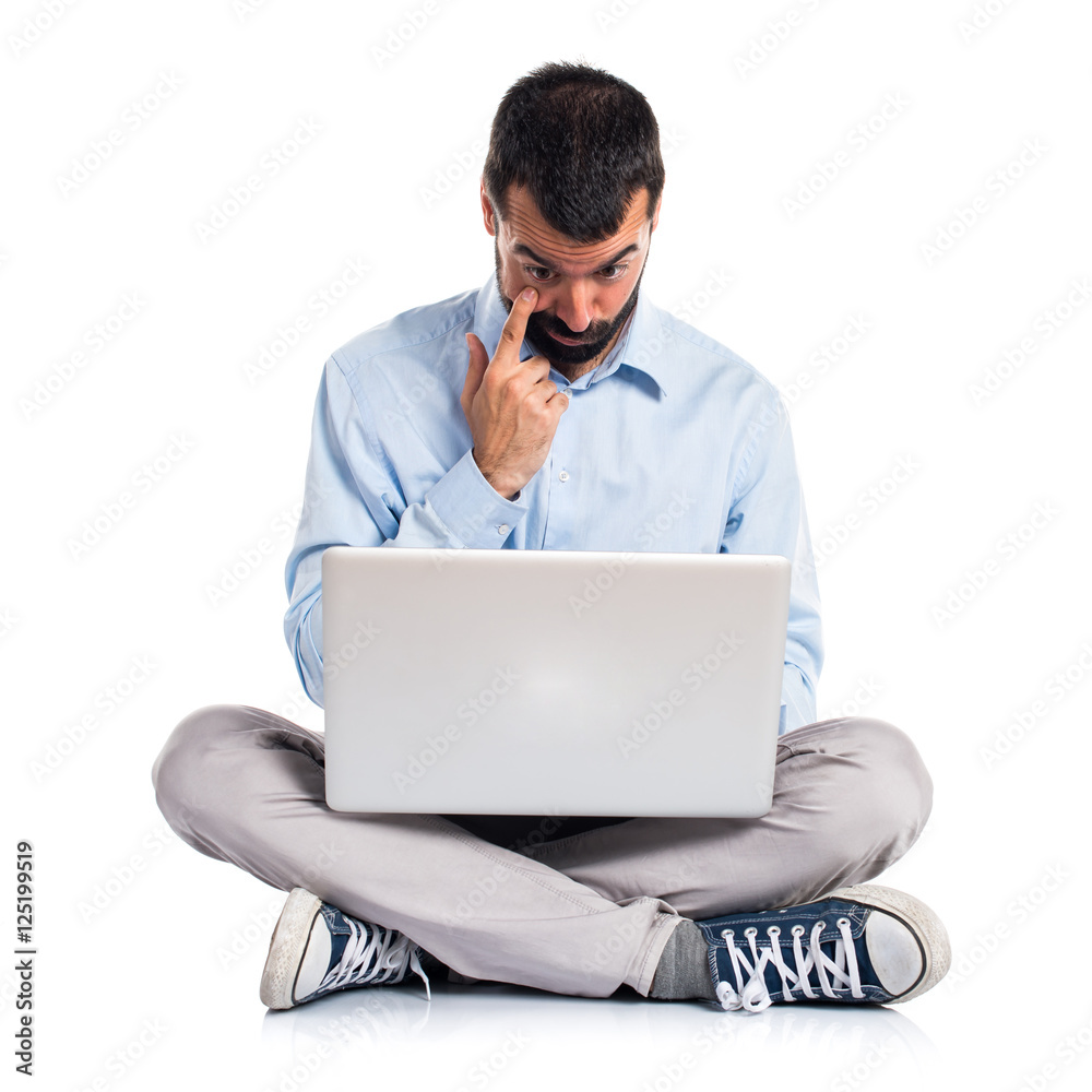Man with laptop showing something Man with laptop showing something