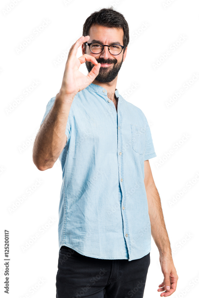 Handsome man making OK sign Handsome man making OK sign