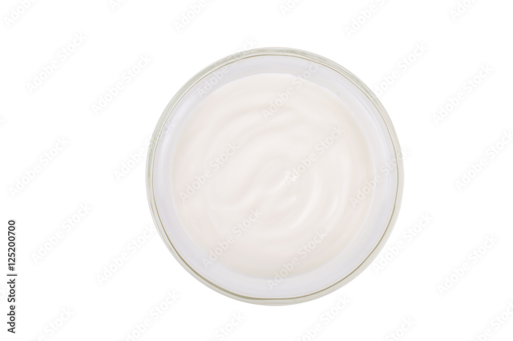 Sour cream in a saucer. On white, isolated background.Top view. Flat lay. Sour cream in a saucer. On white, isolated background.Top view. Flat lay.