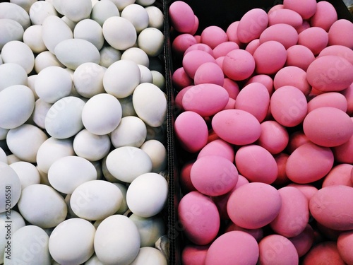 White eggs (Salted eggs) and Pink eggs (Preserved eggs or Century eggs) in the market
