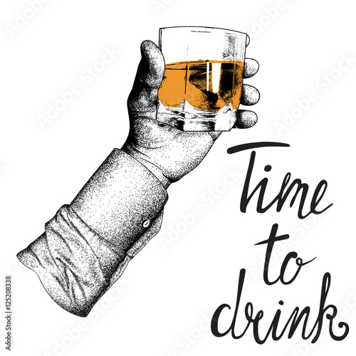 man's hand in shirt raises glass