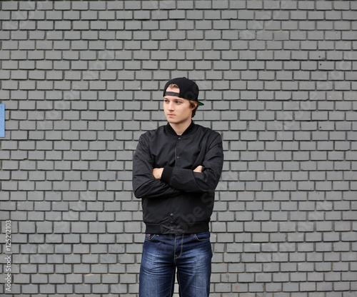 Attractive teenage boy in urban background