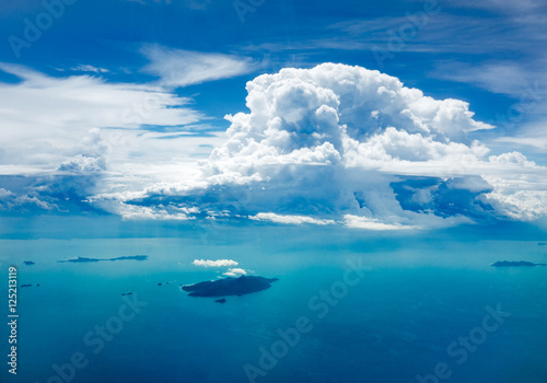 Cloud and ocean with island, aerial view © chat9780