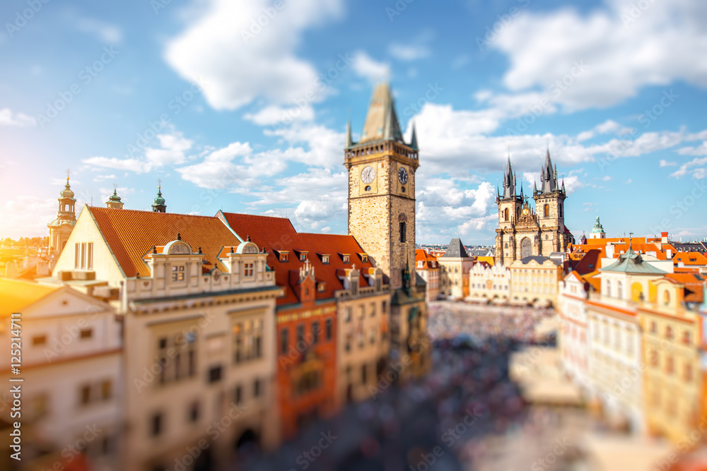 Fototapeta premium Cityscape view on the clock tower and Tyn cathedral on the old square in Prague.
