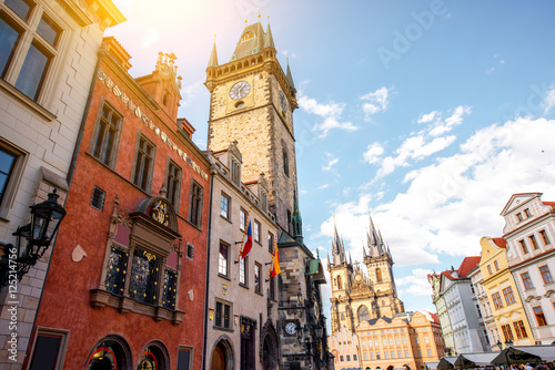 Photography Cityscape view on the clock tower and Tyn cathedral in the old town of Prague