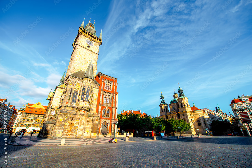 View on the town hall with clock tower in the old town of Prague