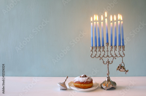 jewish holiday Hanukkah background with menorah