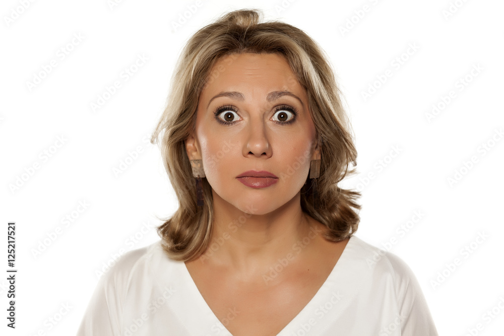 middle-aged pretty woman with wide open eyes middle-aged pretty woman with wide open eyes