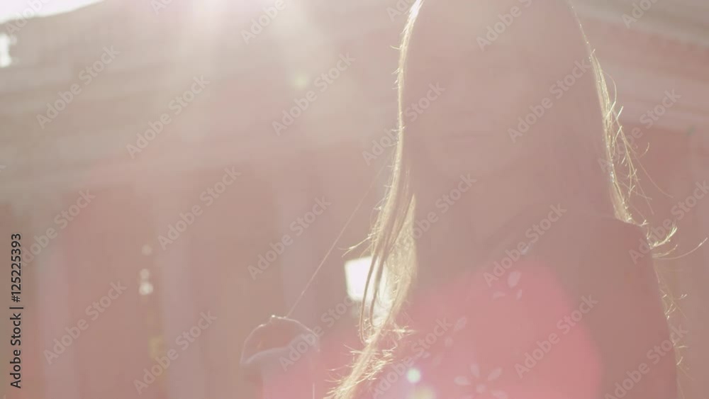 Wind blowing through girl's hair Stock Video | Adobe Stock