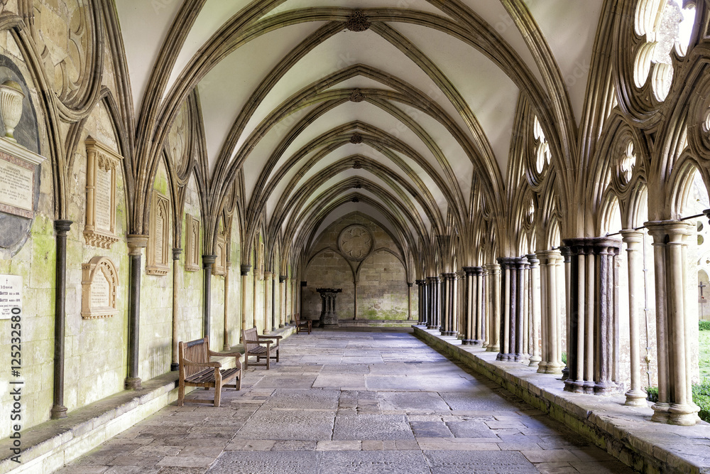 Image of the external covered walkway of the Salisbury Cathedral Cloisters. An exterior walkway around the outside of the Cathedral.