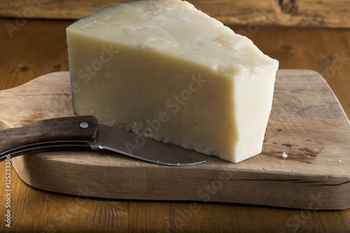 Fotografie pecorino romano cheese made from sheep's milk, Italian typical product