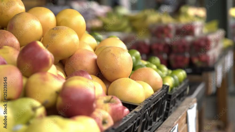 Market with fresh fruits for sale, including oranges.
Market with fresh fruits for sale, including oranges.