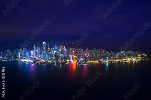 Night aerial view panorama of Hong Kong skyline and Victoria Harbor. Travel destinations © PerfectLazybones