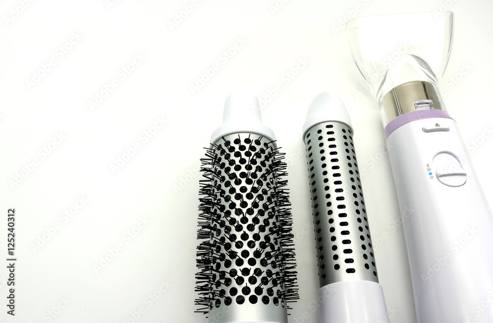 Collection electric hair dryer and hair curler in beauty salon, isolate on white background, Top view with copy space and text.