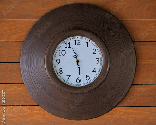 Classic  clock on vintage wall.