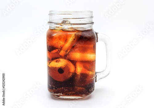 Cola with ice cube in glass on white background including clipping path