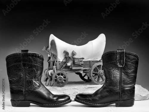 Cowboy boots and toys. photo