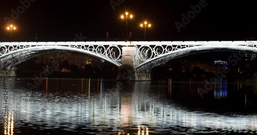 Triana bridge timelapse atnight, 4k. photo