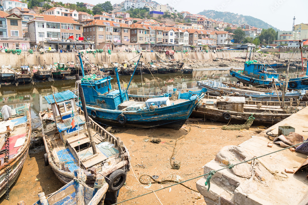 Wooden fishing boats in the village of Shazikou, in the outskirts of Qingdao, Shandong, China
