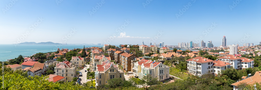View of Old town and Qingdao bay from the hill of XiaoYuShan Park, Qingdao, China. 