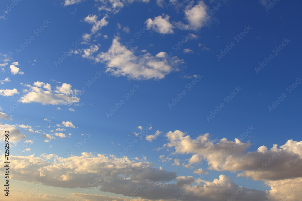 beautifull blue sky with grey, white clouds