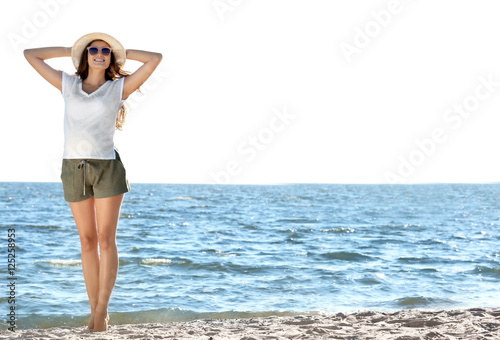 Young pregnant woman standi...