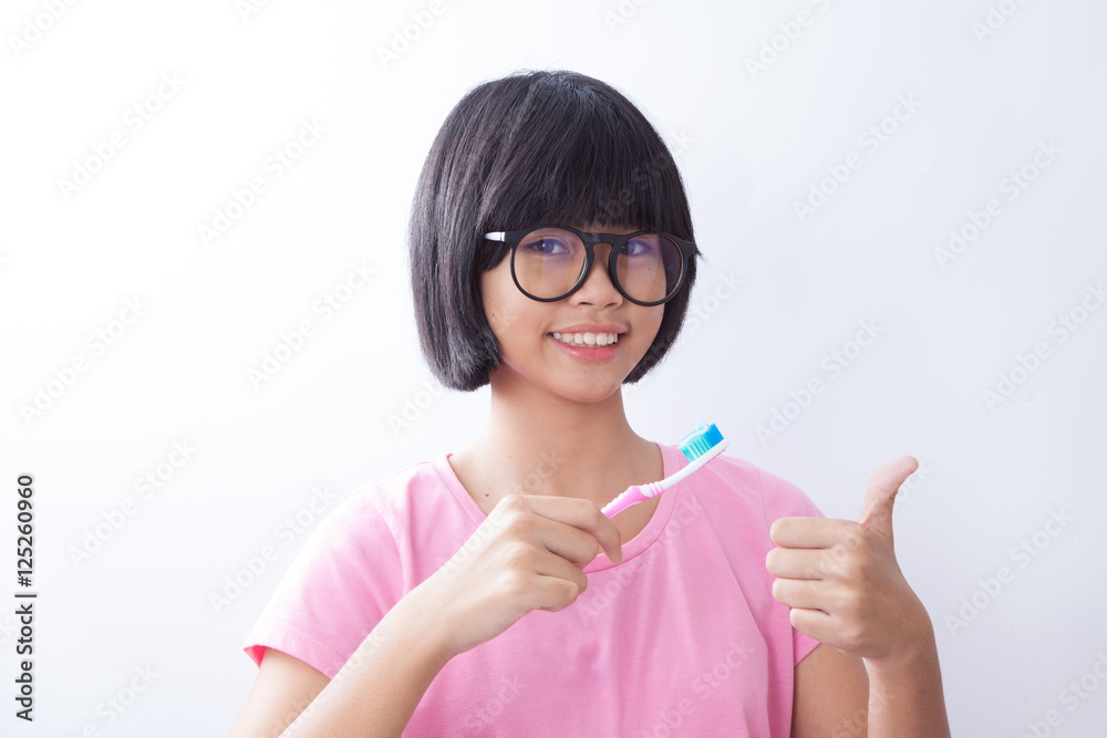 happy young girl with toothbrush happy young girl with toothbrush