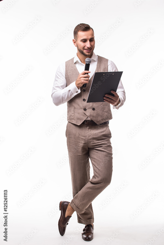 The Showman interviewer with blank. Young elegant man holding microphone against white background.Showman concept. The Showman interviewer with blank. Young elegant man holding microphone against white background.Showman concept.