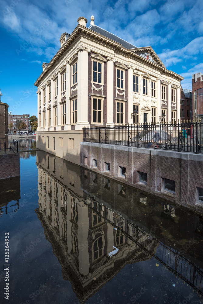 Canal side view of Mauritshuis museum front entrance building ne
