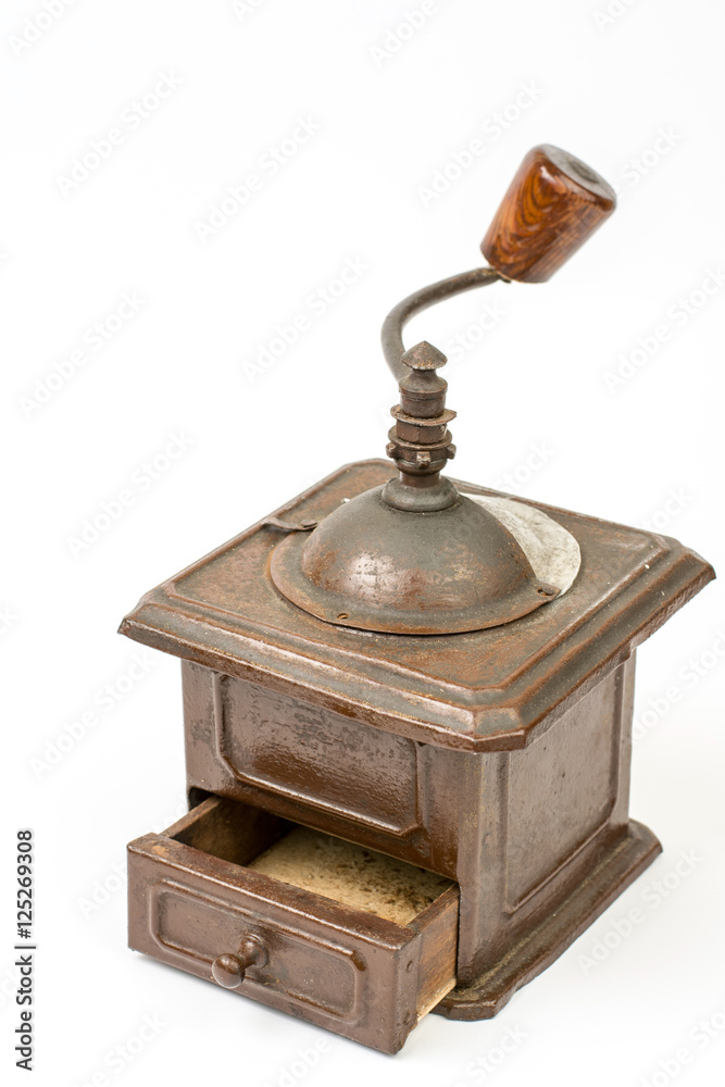 Old rustic wooden hand mill for coffee and spices Old rustic wooden hand mill for coffee and spices